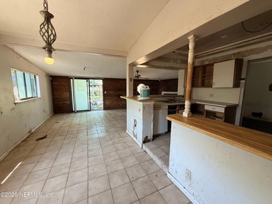 Opportunity awaits! This 1,644-square-foot concrete block home - photo 6