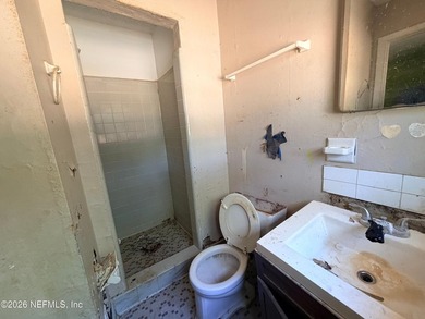 Opportunity awaits! This 1,644-square-foot concrete block home - photo 8