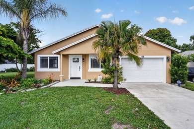 Welcome to this charming 3-bedroom, 2-bathroom CBS home situated - photo 1