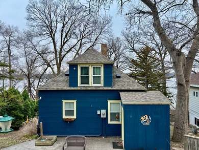 Experience lakefront living in this charming little home on Big - photo 1