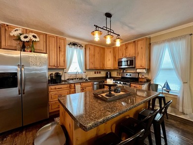 Experience lakefront living in this charming little home on Big - photo 6