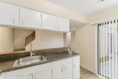 Opportunity awaits in this spacious 3-bed, 2-bath end-unit - photo 12