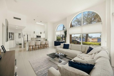 Updated 2BR/2BA corner residence with high ceilings, bright open - photo 1