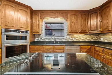 Located in the Lake Forest golf course community in Daphne - photo 22