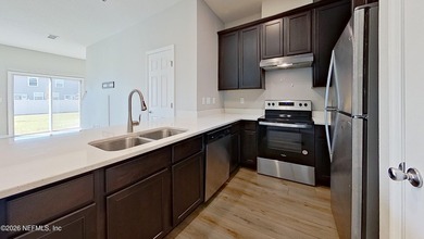 Welcome home to this beautifully maintained 2-bedroom - photo 7