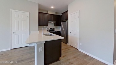 Welcome home to this beautifully maintained 2-bedroom - photo 8
