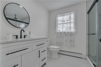 Nestled in the heart of Oakland Beach, this newly renovated - photo 11