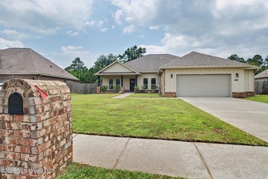 This well-maintained 6-year-old D.R. Horton Parker Plan in the - photo 2