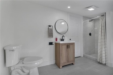 Nestled in the heart of Oakland Beach, this newly renovated - photo 25