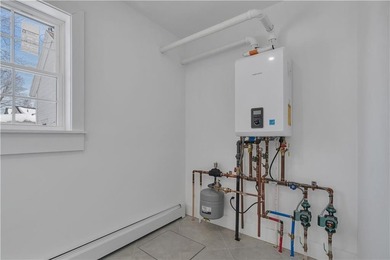 Nestled in the heart of Oakland Beach, this newly renovated - photo 27