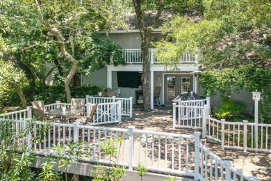 Positioned on a private one-acre homesite with 130 feet of deep - photo 11