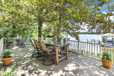 Positioned on a private one-acre homesite with 130 feet of deep - photo 12