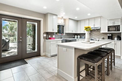 Positioned on a private one-acre homesite with 130 feet of deep - photo 21
