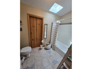 Check out this fully remodeled 3-bed, 2-bath home with a heated - photo 22