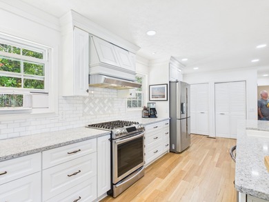 What a view! This beautifully updated 3-bedroom, 2 full and 2 - photo 7