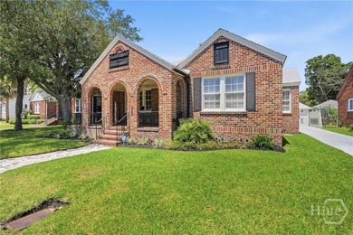 This charming 3-bedroom, 2-bath brick home in highly - photo 2