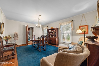 Step into the charm and character of 609 E. Main Street, where - photo 11