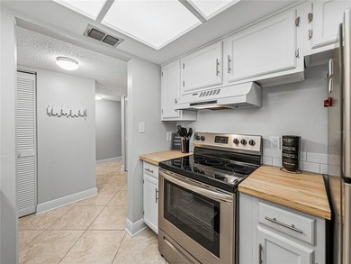 Welcome to this inviting one-bedroom, one-bathroom ground-floor - photo 11