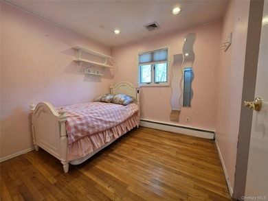 Spacious hi ranch with 4 bedrooms and 3 full bathrooms, set on - photo 11