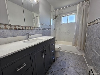 Spacious hi ranch with 4 bedrooms and 3 full bathrooms, set on - photo 12