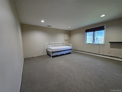 Spacious hi ranch with 4 bedrooms and 3 full bathrooms, set on - photo 13