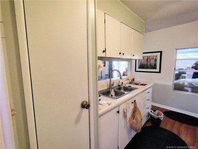 Great remodeled 2 bedroom 2 bath home. Pass thru from kitchen to - photo 6