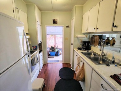Great remodeled 2 bedroom 2 bath home. Pass thru from kitchen to - photo 7