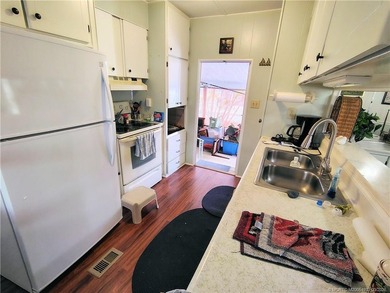 Great remodeled 2 bedroom 2 bath home. Pass thru from kitchen to - photo 8