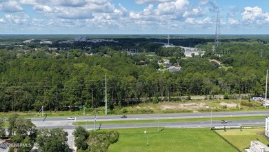 Package deal 2 parcels equal 1.062 acres located on Philips Hwy - photo 8