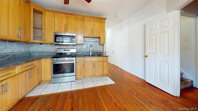 Welcome to this legal two-family home located in Jamaica, Queens - photo 2