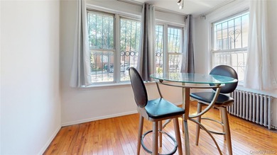 Welcome to this legal two-family home located in Jamaica, Queens - photo 3