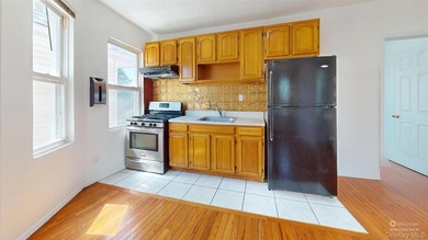 Welcome to this legal two-family home located in Jamaica, Queens - photo 5