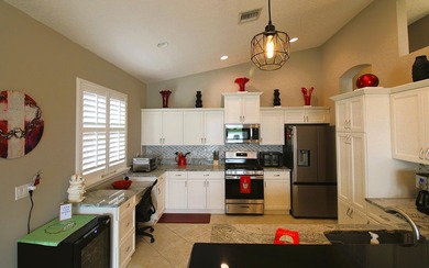 Meticulously maintained open *Sapphire* floorplan w/serene water - photo 18