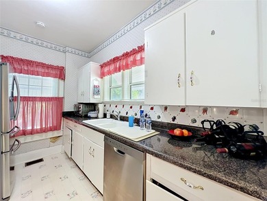 Welcome home to this quaint 3 bedroom 1 1/2 bath home. Built in - photo 11
