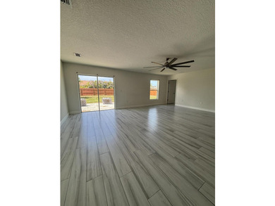 This beautifully updated 4-bedroom home with a den boasts new - photo 2