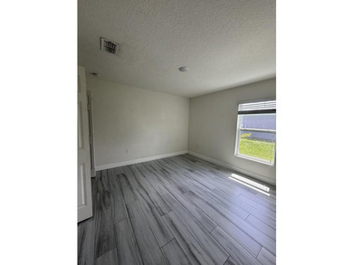 This beautifully updated 4-bedroom home with a den boasts new - photo 4