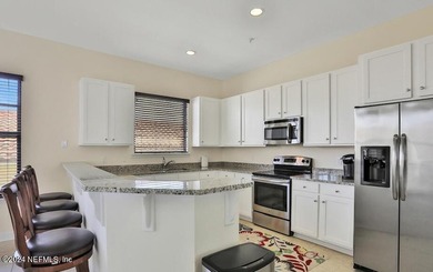Located in Crosswinds at Palencia on Market Street, this Work/ - photo 4