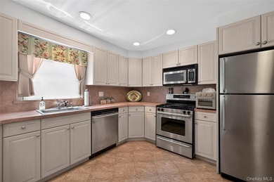 Located on a lovely, quiet street in Northwest Yonkers, this - photo 31