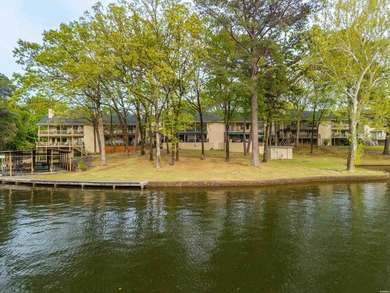 Exquisite Lakeside Living! Renovated Townhome with Premium - photo 1