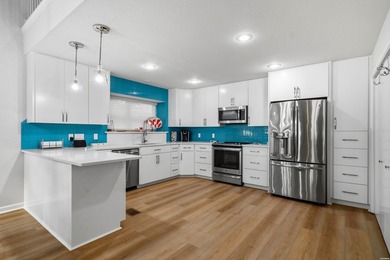 Exquisite Lakeside Living! Renovated Townhome with Premium - photo 9