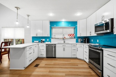 Exquisite Lakeside Living! Renovated Townhome with Premium - photo 10