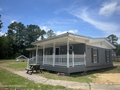 This 3-bedroom, 2-bath home offers 1,056 square feet of living - photo 1