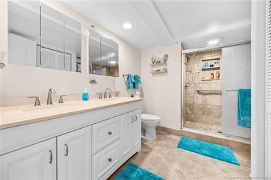 Totally remodeled first floor end unit in park like setting - photo 10