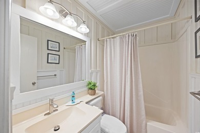 Charming, fully furnished, ocean view condo on Garden City Beach - photo 21