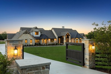 Reintroducing this 2021 custom built home with a newly - photo 1
