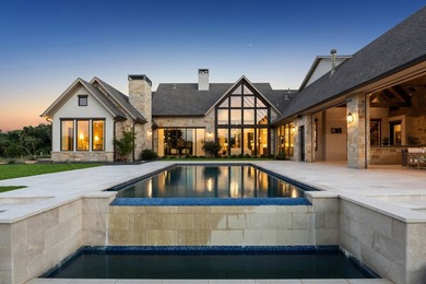 Reintroducing this 2021 custom built home with a newly - photo 3