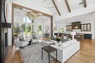 Reintroducing this 2021 custom built home with a newly - photo 8