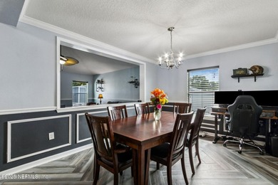 This delightful 3-bedroom, 2-bathroom home offers a warm and - photo 3