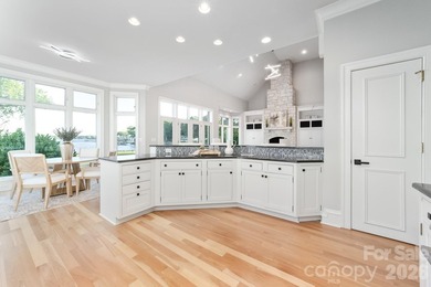 Positioned along a pristine shoreline on Lake Norman, this gated - photo 14