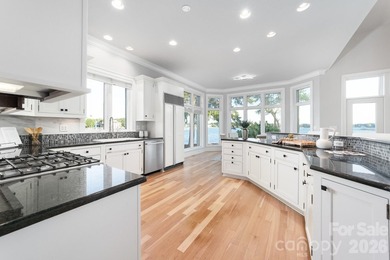 Positioned along a pristine shoreline on Lake Norman, this gated - photo 15
